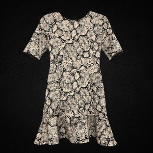 Snakeskin print Express dress with ruffle along the bottle